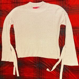 light pink sweater